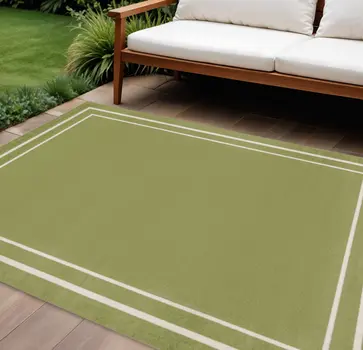 6' X 9' Green And Ivory Indoor Outdoor Area Rug