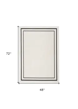 4' X 6' Ivory And Black Indoor Outdoor Area Rug