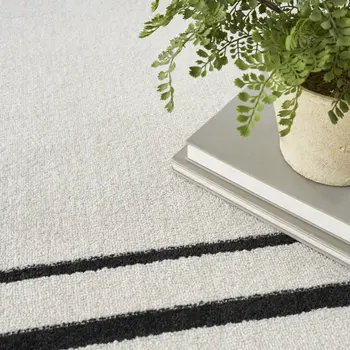6' X 9' Ivory And Black Indoor Outdoor Area Rug