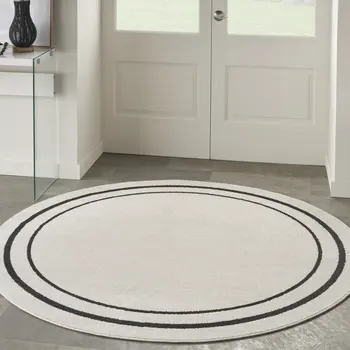 8' Ivory And Black Round Indoor Outdoor Area Rug