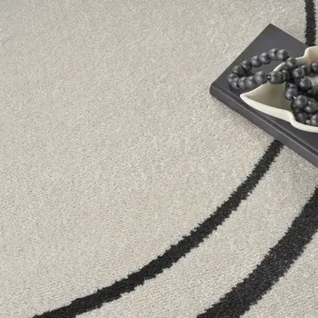 8' Ivory And Black Round Indoor Outdoor Area Rug