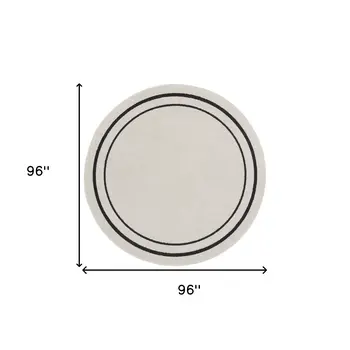 8' Ivory And Black Round Indoor Outdoor Area Rug