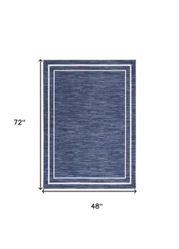 4' X 6' Navy Blue And Ivory Indoor Outdoor Area Rug