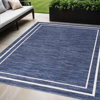 5' X 7' Navy Blue And Ivory Indoor Outdoor Area Rug
