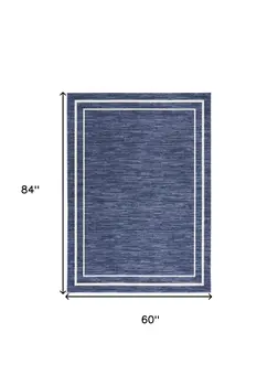 5' X 7' Navy Blue And Ivory Indoor Outdoor Area Rug