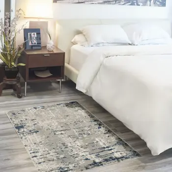 2' X 4' Gray and Ivory Abstract Power Loom Area Rug