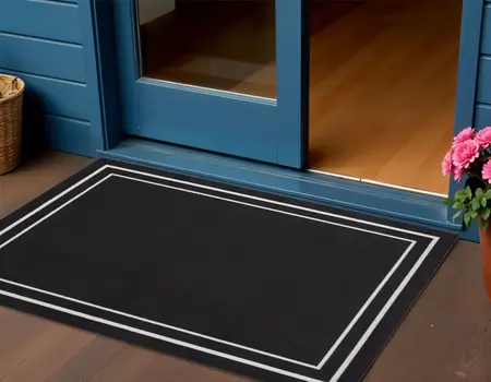 2' X 4' Black And Ivory Indoor Outdoor Area Rug