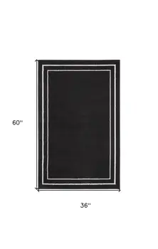 3' X 5' Black And Ivory Indoor Outdoor Area Rug