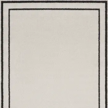 2' X 4' Ivory And Black Indoor Outdoor Area Rug