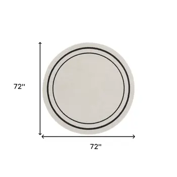 6' Ivory And Black Round Indoor Outdoor Area Rug