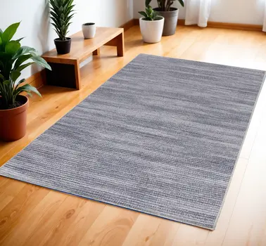 4' X 6' Gray and Ivory Abstract Power Loom Washable Non Skid Area Rug