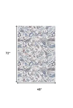 4' X 6' Ivory and Blue Floral Power Loom Washable Non Skid Area Rug