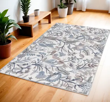 4' X 6' Ivory and Blue Floral Power Loom Washable Non Skid Area Rug