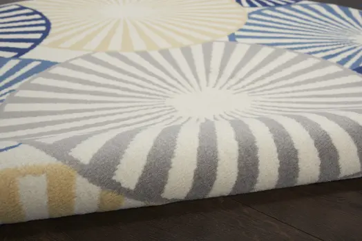 5' Blue and Beige Round Geometric Power Loom Area Rug