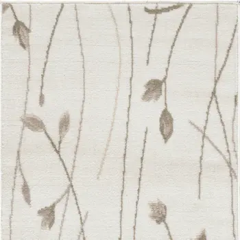 2' X 4' Beige and Ivory Floral Power Loom Area Rug
