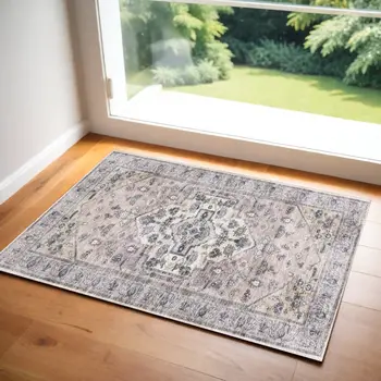 2' X 4' Pink and Ivory Medallion Power Loom Distressed Washable Non Skid Area Rug