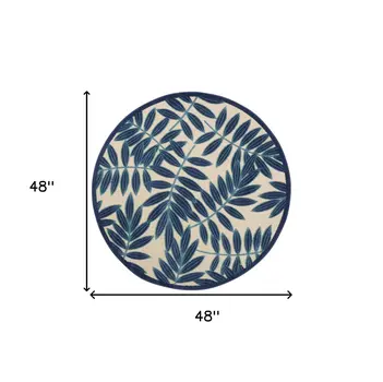 4' Navy Blue And Ivory Round Botanical Leaves Indoor Outdoor Area Rug