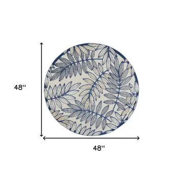 4' Navy Blue And Ivory Round Botanical Leaves Indoor Outdoor Area Rug
