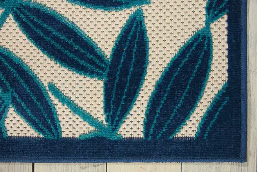 4' X 6' Navy Blue And Beige Palm Leaf Indoor Outdoor Area Rug
