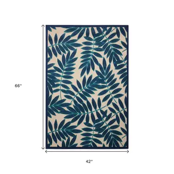 4' X 6' Navy Blue And Beige Palm Leaf Indoor Outdoor Area Rug