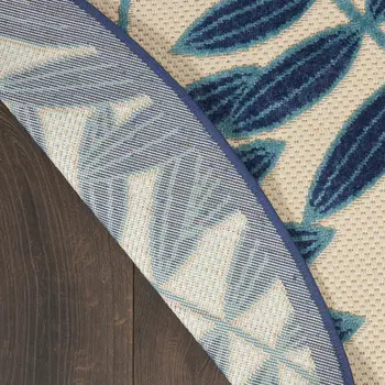 8' Navy Blue And Ivory Round Botanical Leaves Indoor Outdoor Area Rug