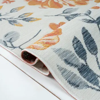 5' X 7' Ivory Orange and Blue Floral Stain Resistant Indoor Outdoor Area Rug