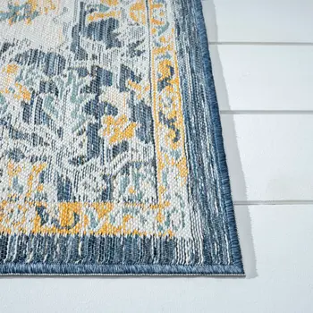 5' X 7' Blue and Ivory Medallion Stain Resistant Indoor Outdoor Area Rug