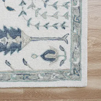 8' X 10' Ivory and Blue Wool Floral Hand Tufted Area Rug