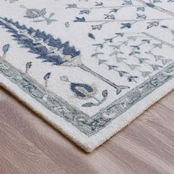 9' X 12' Ivory and Blue Wool Floral Hand Tufted Area Rug