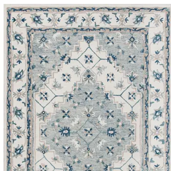 8' X 10' Blue and Ivory Wool Floral Hand Tufted Area Rug