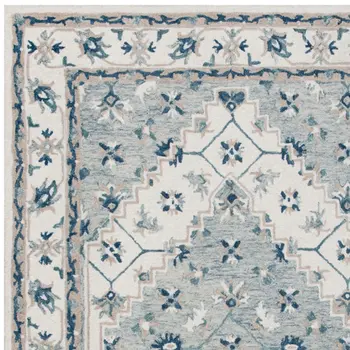9' X 12' Blue and Ivory Wool Floral Hand Tufted Area Rug