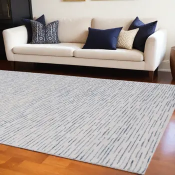 9' X 12' Ivory and Blue Wool Striped Hand Tufted Area Rug