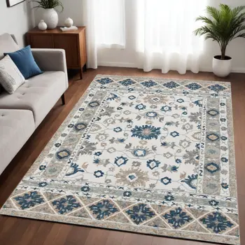 5' X 8' Blue and Ivory Wool Floral Hand Tufted Area Rug