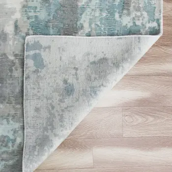 9' X 12' Ivory Blue and Gray Abstract Wool Blend Hand Loomed Area Rug