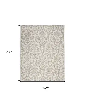 5' X 7' Beige and Ivory Damask Distressed Non Skid Area Rug