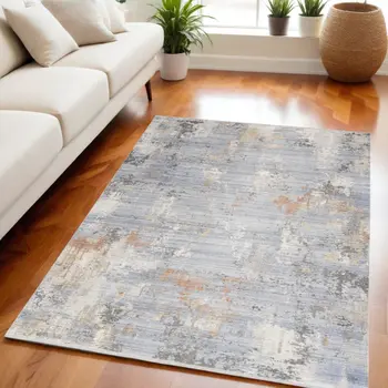 5' X 8' Beige Blue and Gray Abstract Area Rug With Fringe