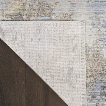 5' X 8' Beige Blue and Gray Abstract Area Rug With Fringe