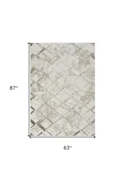 5' X 7' Beige and Ivory Geometric Non Skid Area Rug