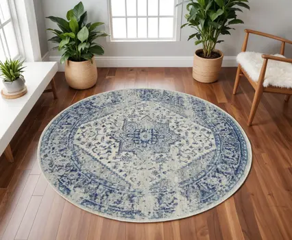 8' Ivory And Light Blue Floral Medallion Distressed Round Rug
