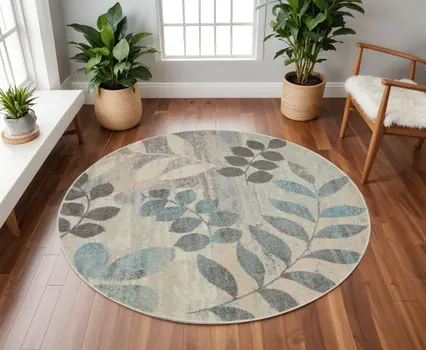 8' Ivory Gray And Blue Botanical Leaves Round Rug