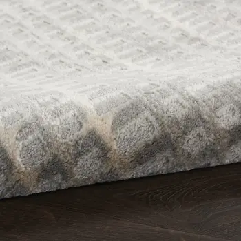 5' X 7' Beige And Gray Abstract Indoor Outdoor Area Rug