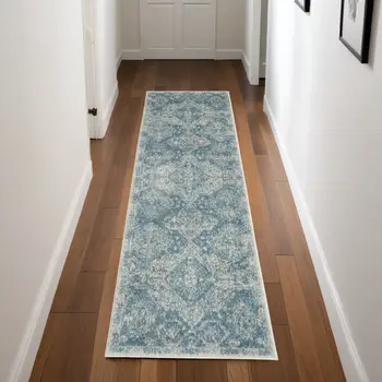 7' Ivory and Light Blue Geometric Distressed Runner Rug