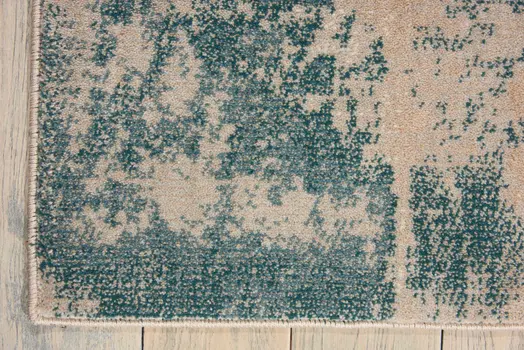 5' X 7' Teal and Ivory Abstract Non Skid Area Rug