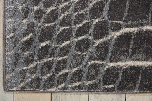 5' X 7' Beige Charcoal and Cream Animal Print Distressed Non Skid Area Rug
