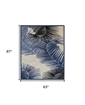 5' X 7' Navy Blue Ivory And Black Palm Leaf Indoor Outdoor Area Rug