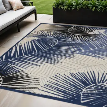 5' X 7' Navy Blue Ivory And Black Palm Leaf Indoor Outdoor Area Rug