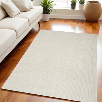 5' X 7' Ivory and Gray Abstract Area Rug