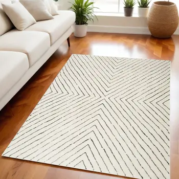 5' X 7' Ivory and Black Abstract Area Rug