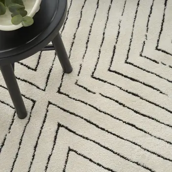 5' X 7' Ivory and Black Abstract Area Rug