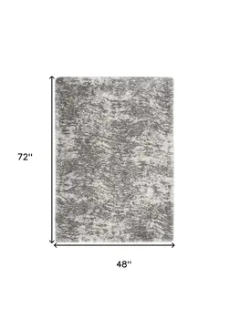 4' X 6' Charcoal and Ivory Abstract Shag Area Rug